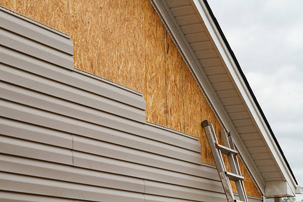 Professional Siding Contractor technician working in Boulder, CO